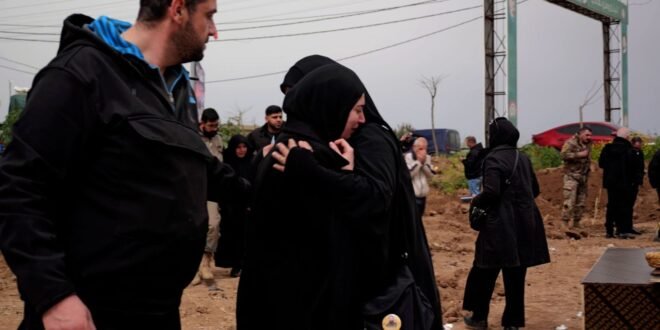 Some cried while others stared blankly ahead at a makeshift grave in Lebanon’s evacuation zone | World News