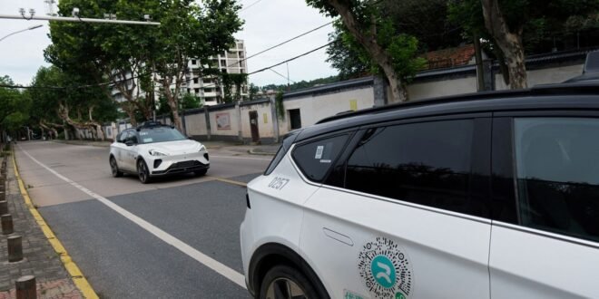 ‘System crash’ causes more than 100 driverless taxis to stop in traffic in China | World News