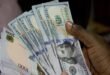 The naira fetched N12.51 against the dollar in the official market