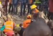 A man rescued alive after 9 hours under the rubble of a 3-story building in Abuja (Video)