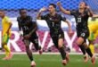 Canada beat South Africa 1–0 with an injury-time goal to reach the round of 16