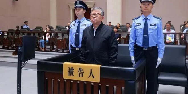A Chinese court sentenced a former government official to death for accepting bribes