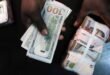Naira depreciated to ₦1,379.06 per dollar in the official market