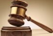 Police charge two brothers and a woman for the alleged murder of an Abuja businessman