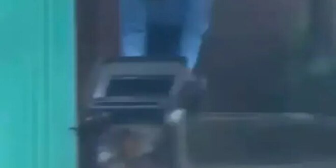 The security guard was arrested after video showed him throwing rubbish in a drain