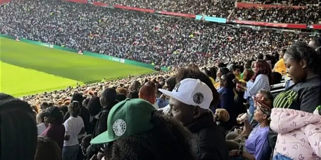 Jerry Eze of Nigeria leads the faithful in prayer at Manchester United’s Old Trafford