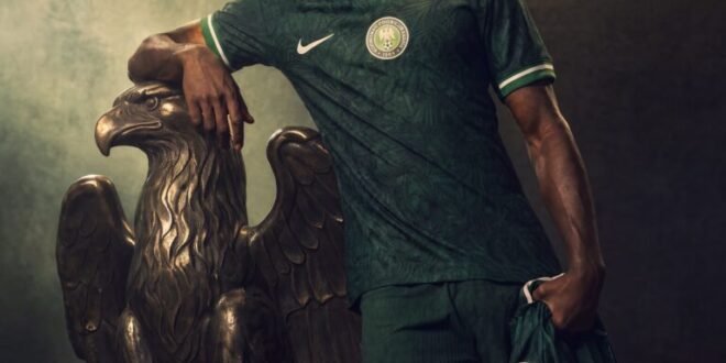 Newly invited Super Eagles striker Ilenikhena poses in a Super Eagles jersey