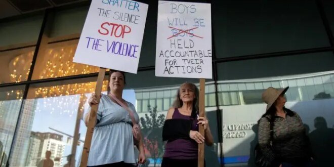 Protesters gather in Edmonton before the Oilers game