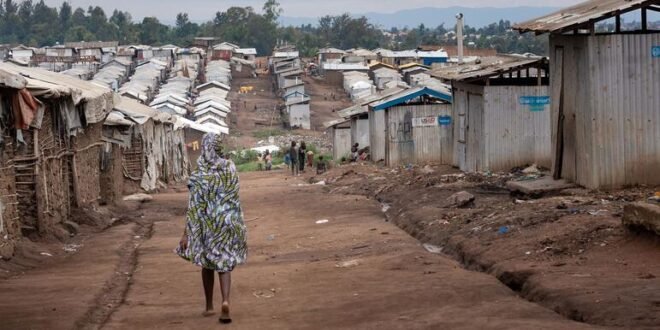 The response to Ebola faces a setback when a transit center in a Congolese camp catches fire